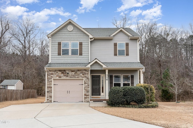 view of front of property with a garage