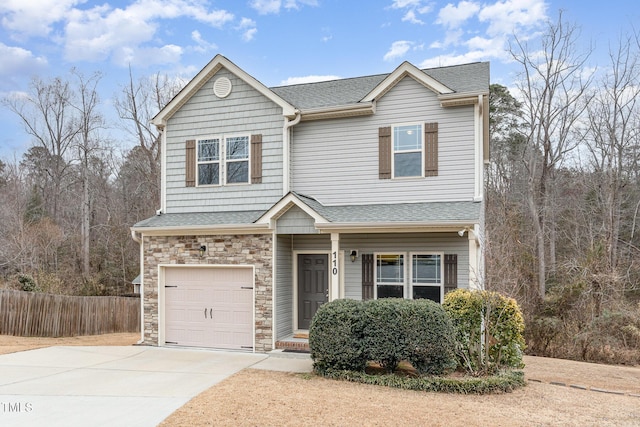 view of front of property with a garage