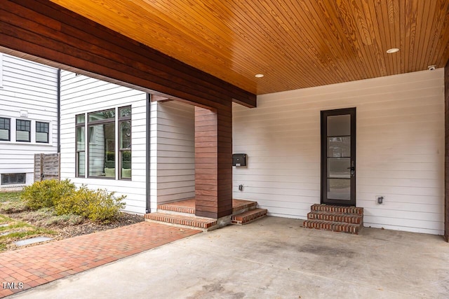 doorway to property featuring a patio area