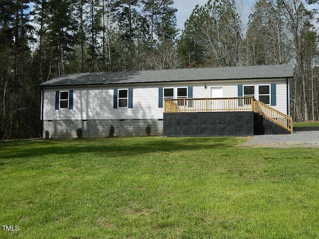 3050 Bennett Siler City Rd, Bennett, NC 27208 - view of front of property featuring a front yard, crawl space, a shingled roof, and a wooden deck