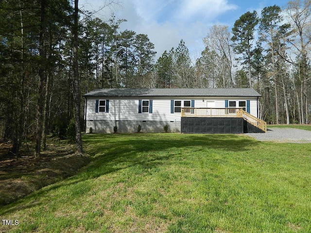 3050 Bennett Siler City Rd, Bennett, NC 27208 - manufactured / mobile home featuring crawl space, stairway, a deck, and a front lawn