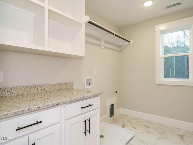 washroom with electric dryer hookup, visible vents, marble finish floor, washer hookup, and baseboards