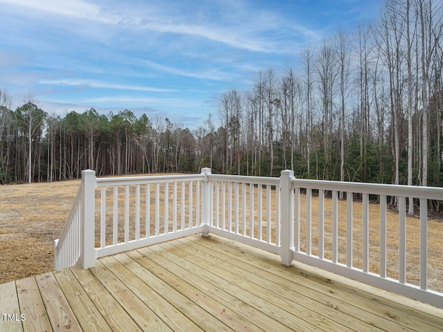 deck with a wooded view