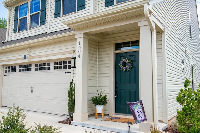 property entrance featuring a garage