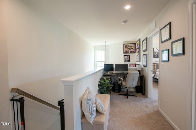 home office with light colored carpet