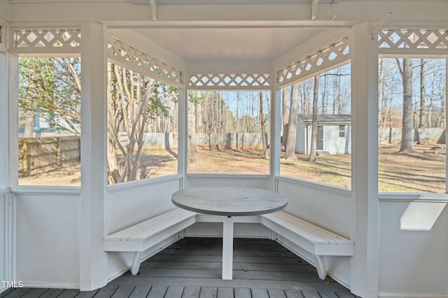 unfurnished sunroom featuring a wealth of natural light