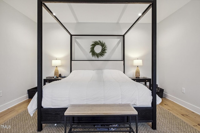 bedroom with wood-type flooring