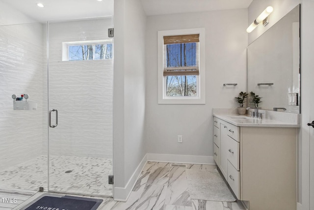 bathroom featuring vanity and walk in shower