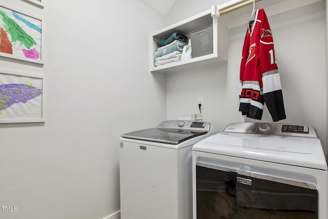 laundry area with separate washer and dryer