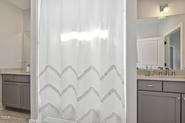 bathroom featuring vanity and a shower with curtain