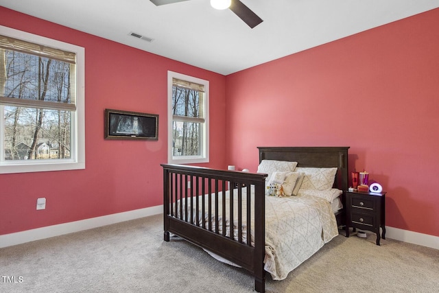 bedroom featuring ceiling fan and carpet flooring