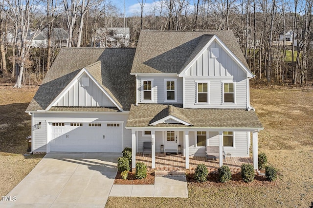 view of front of home with a garage and covered porch