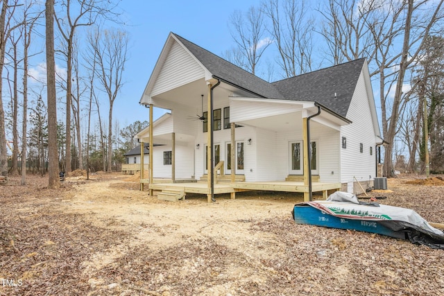 back of property with central air condition unit and ceiling fan