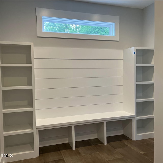 mudroom featuring dark wood-style flooring