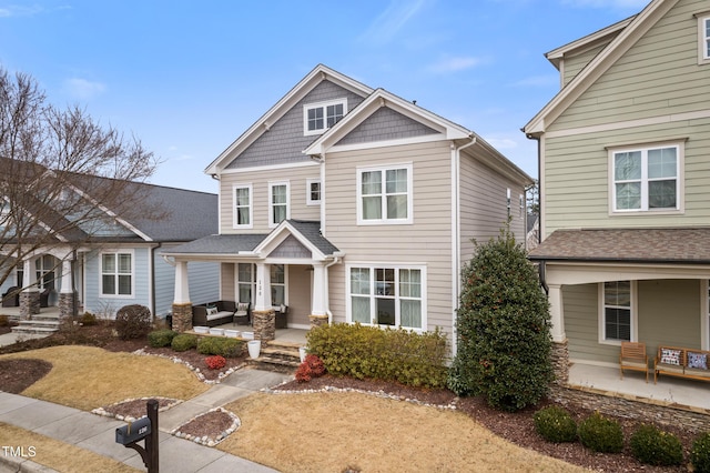 craftsman-style home featuring covered porch