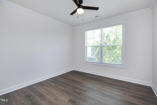 spare room featuring ornamental molding, dark hardwood / wood-style floors, and ceiling fan