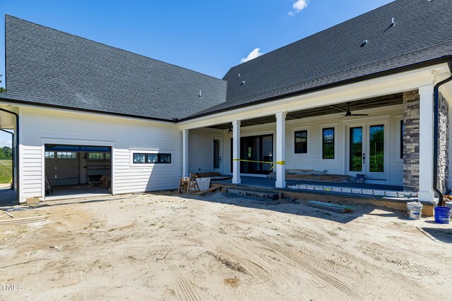 6509 Zebulon Rd, Wake Forest, NC 27587 - rear view of property with a ceiling fan, an attached garage, and a shingled roof