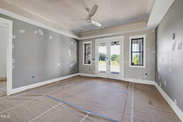 6509 Zebulon Rd, Wake Forest, NC 27587 - empty room with a raised ceiling, french doors, wood ceiling, a ceiling fan, and baseboards