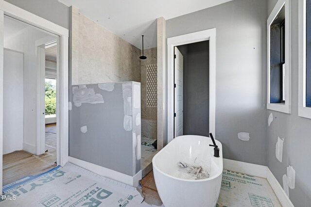 6509 Zebulon Rd, Wake Forest, NC 27587 - full bath featuring walk in shower and a freestanding bath