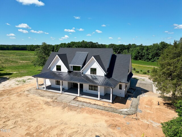 6509 Zebulon Rd, Wake Forest, NC 27587 - modern farmhouse featuring metal roof