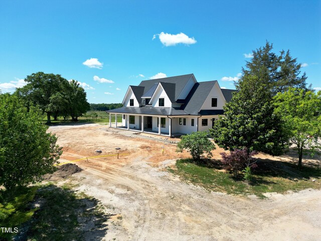 6509 Zebulon Rd, Wake Forest, NC 27587 - view of front facade with a porch and driveway