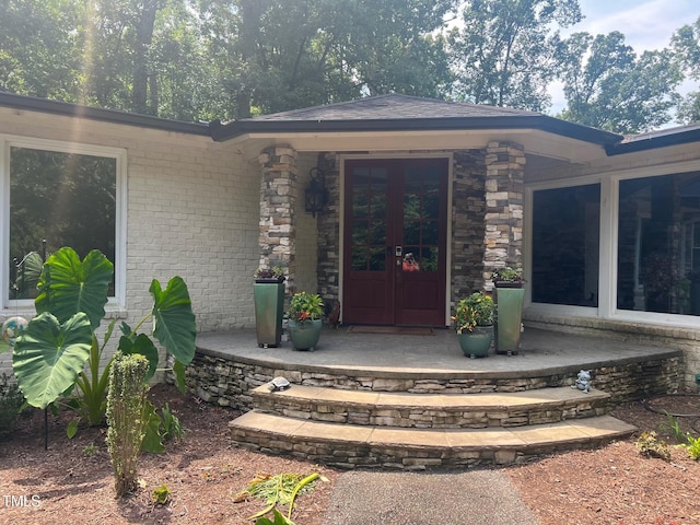 doorway to property featuring french doors