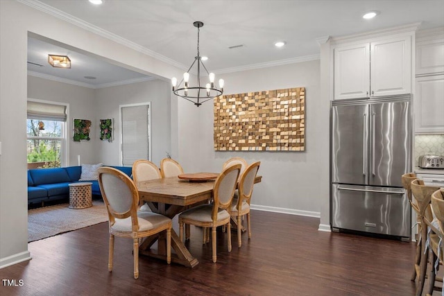 dining space featuring ornamental molding, dark wood-type flooring, and a notable chandelier