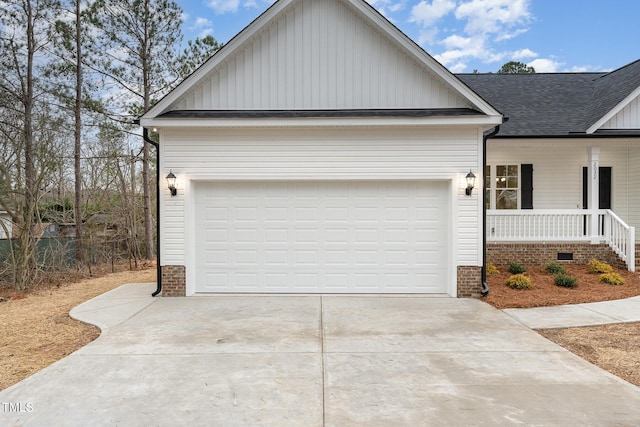 view of front of property featuring a garage and covered porch