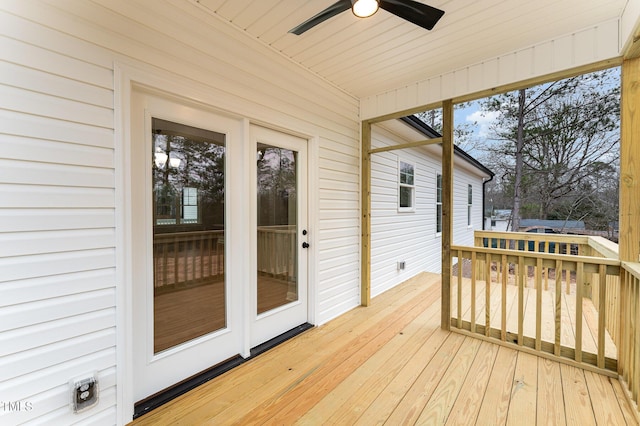 wooden deck with ceiling fan