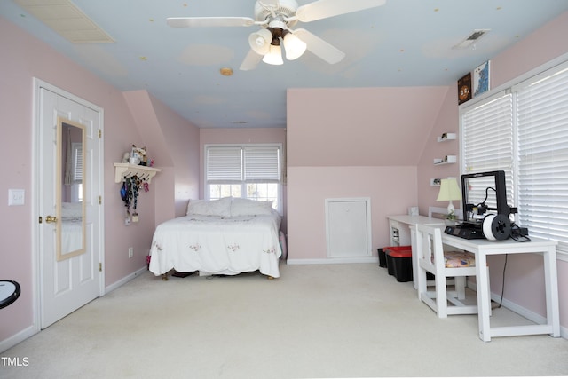 bedroom featuring light colored carpet and ceiling fan