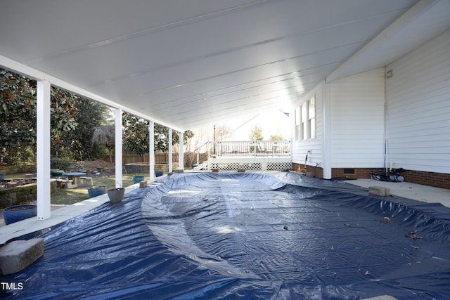 view of swimming pool featuring a wooden deck