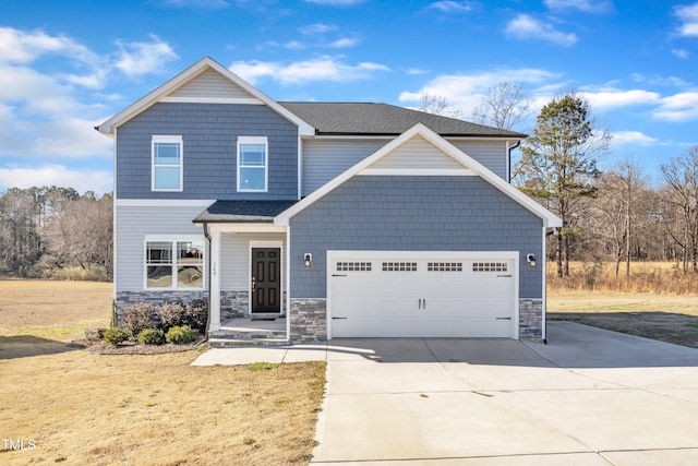 craftsman house with a garage