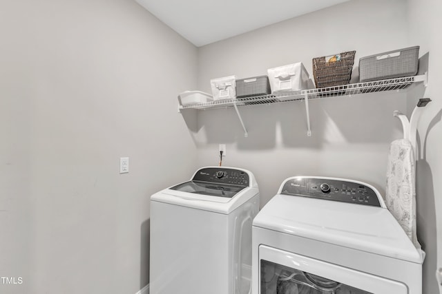 laundry area featuring separate washer and dryer