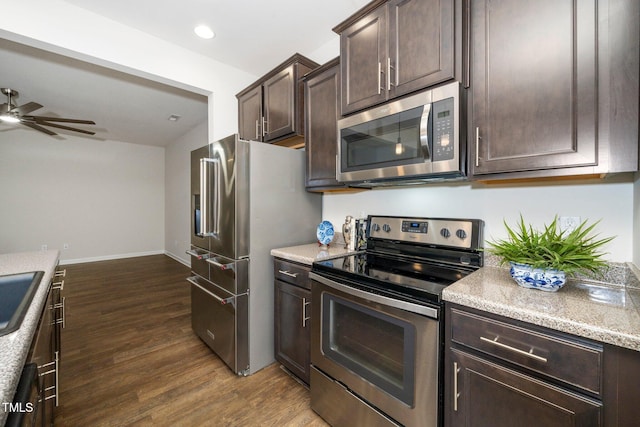 205 Spring Flower Ln, Durham, NC 27703 - kitchen featuring dark brown cabinetry, recessed lighting, a ceiling fan, dark wood finished floors, and stainless steel appliances