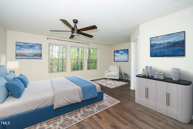 205 Spring Flower Ln, Durham, NC 27703 - bedroom featuring a ceiling fan and dark wood-style floors