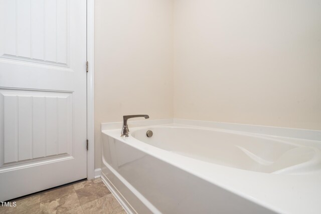 205 Spring Flower Ln, Durham, NC 27703 - bathroom with a garden tub