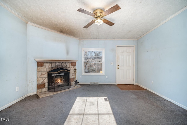 unfurnished living room featuring carpet floors, a textured ceiling, ornamental molding, and a fireplace