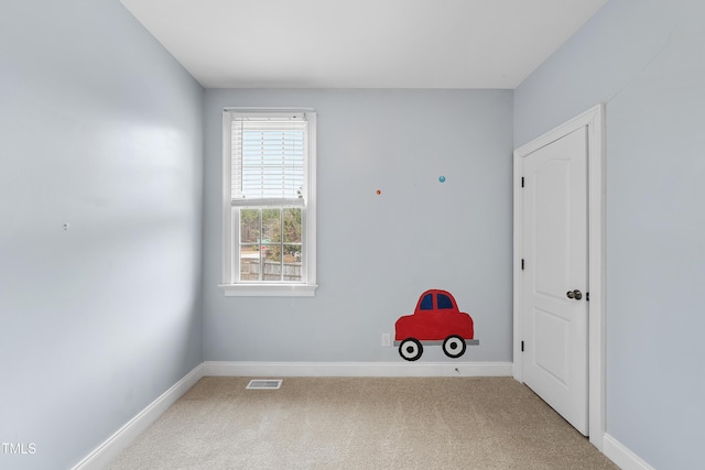 view of carpeted spare room