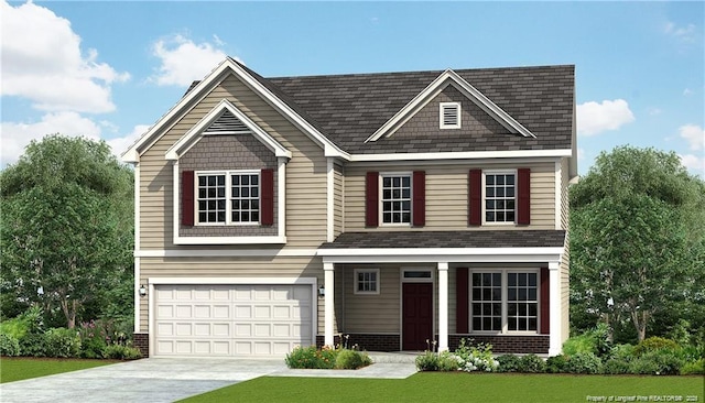 view of front of house featuring a front yard and a garage