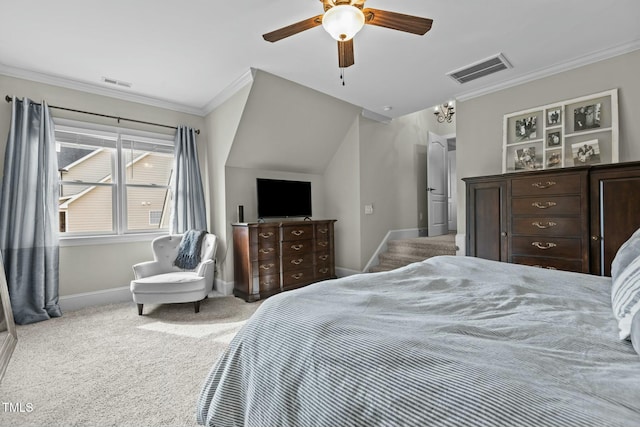 bedroom with ornamental molding, ceiling fan, and carpet