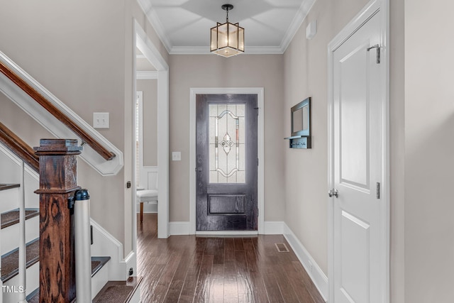 entrance foyer featuring stairway, baseboards, ornamental molding, and dark wood-style flooring