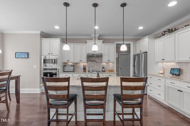 kitchen featuring appliances with stainless steel finishes, dark wood-type flooring, crown molding, and white cabinetry