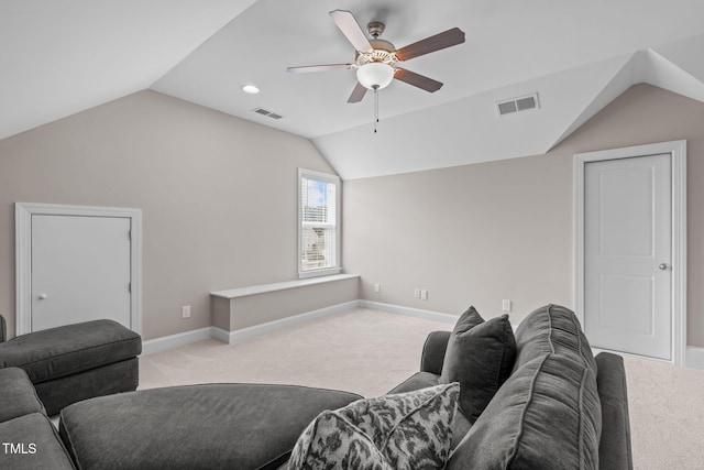 living area featuring lofted ceiling, carpet flooring, visible vents, and baseboards