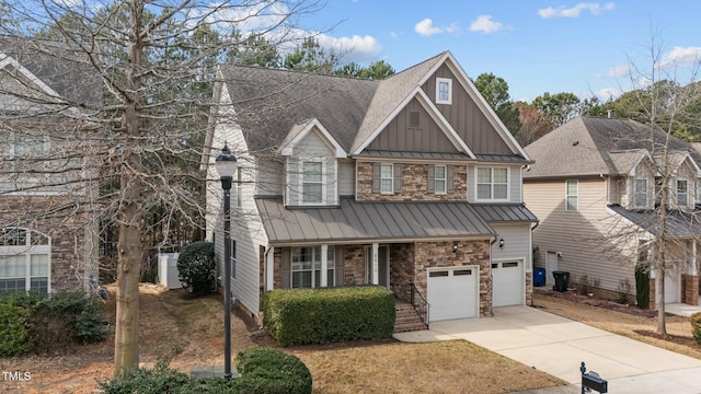 craftsman-style house featuring driveway, a standing seam roof, stone siding, board and batten siding, and metal roof