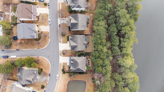 birds eye view of property with a residential view