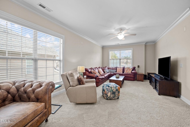 living area with visible vents, carpet, and ornamental molding