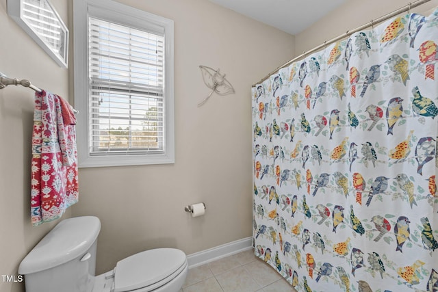 full bath with curtained shower, baseboards, toilet, and tile patterned flooring