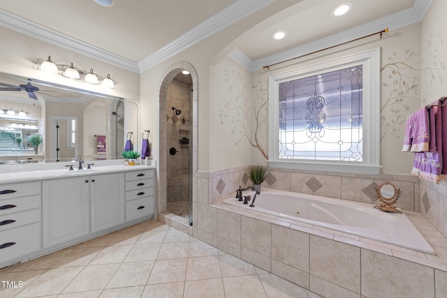 bathroom featuring tile patterned flooring, vanity, ceiling fan, crown molding, and independent shower and bath