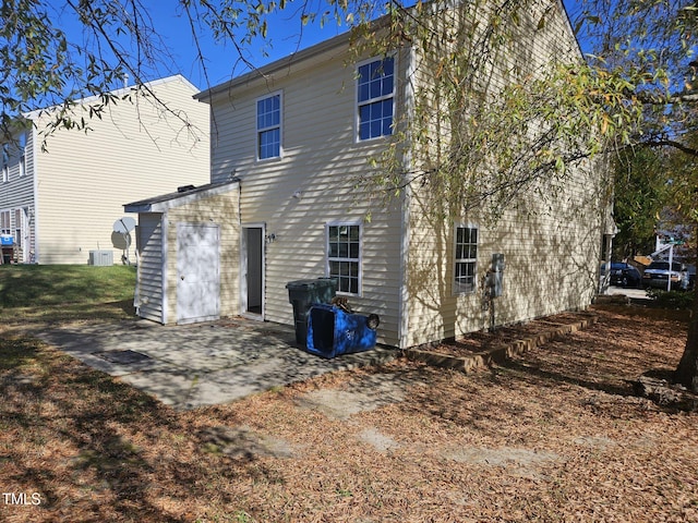 back of house featuring a patio and central AC unit