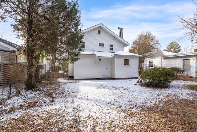 view of snow covered property